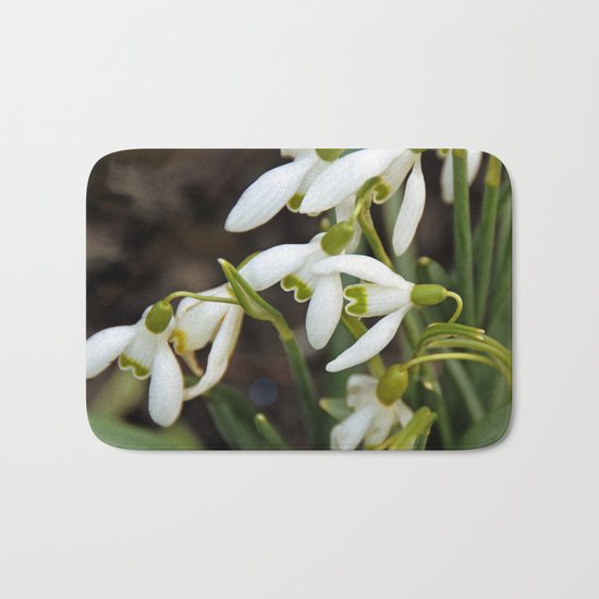 First signs of spring (snowdrops) Bath Mat