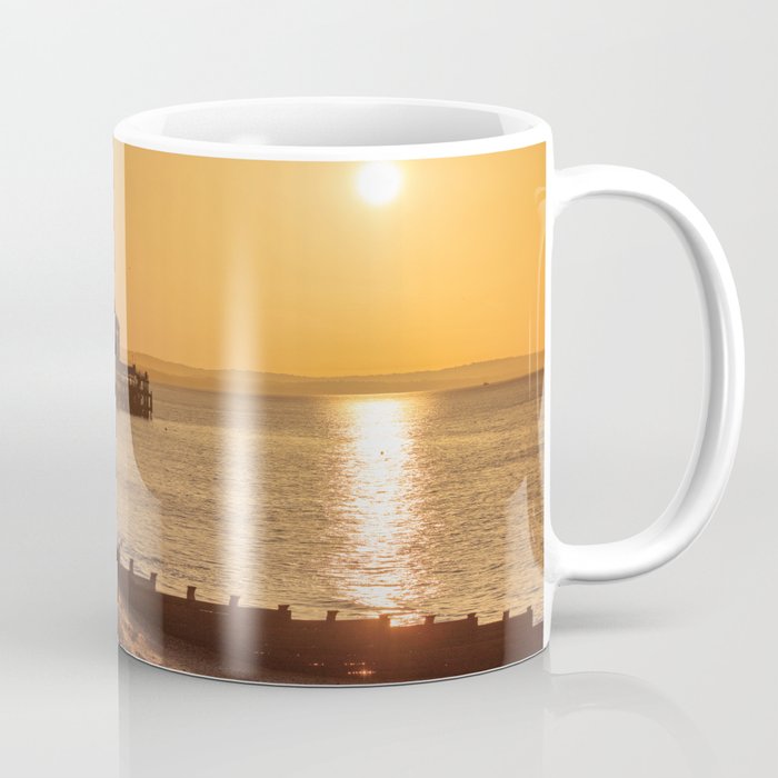 Beautiful sunrise over English Channel horizon and Eastbourne pier, East Sussex, UK Coffee Mug