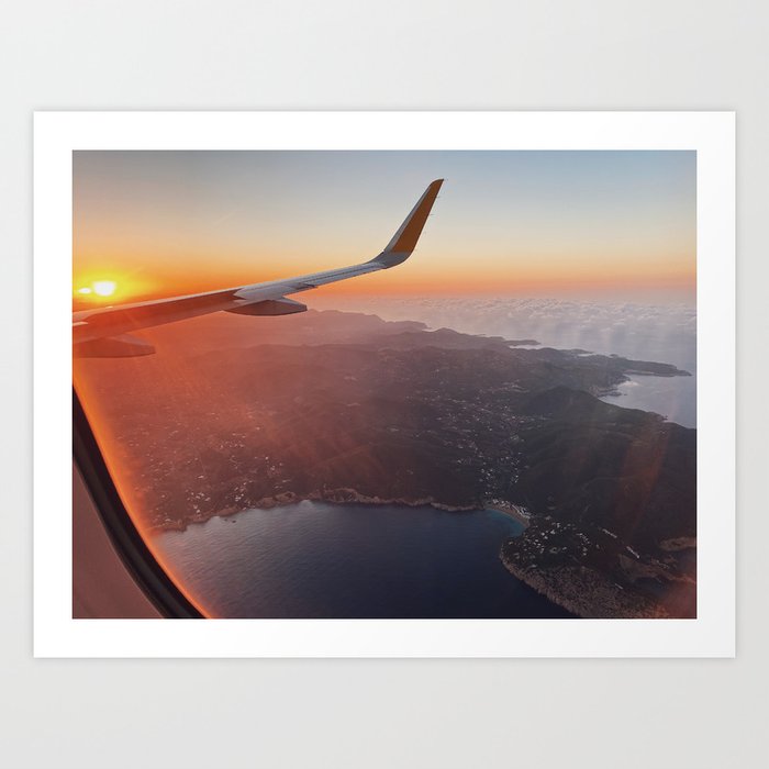 Sunset view of Ibiza from an airplane Art Print by CottonCandyClouds