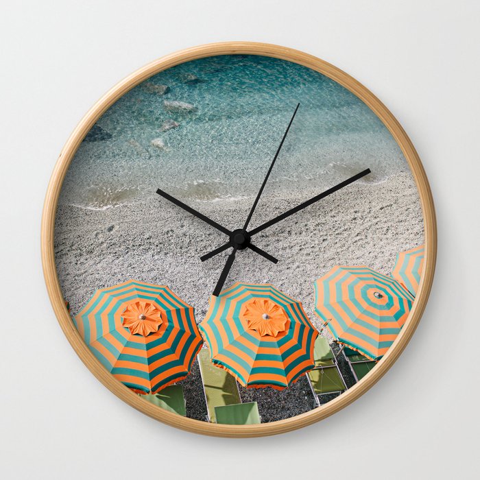 Umbrellas on the beach Wall Clock