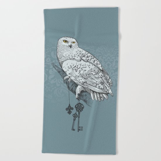 Secrets of the Snowy Owl Beach Towel