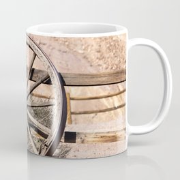 Old wagon wheel against a fence Coffee Mug