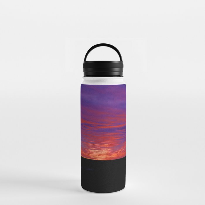 Amethyst pink sunrise burning bright on underbelly of clouds purple sky color photograph / photography for home and wall decor Water Bottle