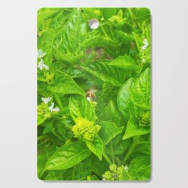 Bee on nature plants  Cutting Board