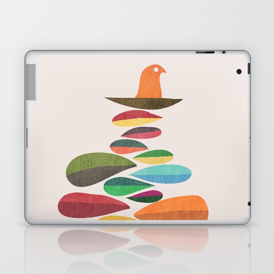 Bird nesting on top of pebbles hill Laptop & iPad Skin