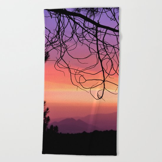 Purple sunset. At the woods Beach Towel