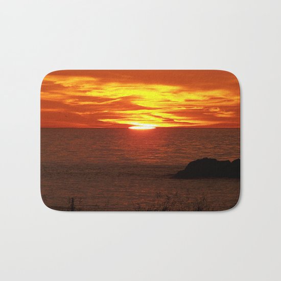 Flaming Skies Across the Sea Bath Mat