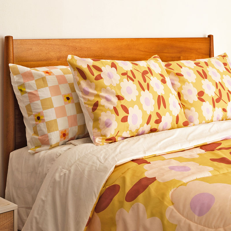 bed with floral comforter