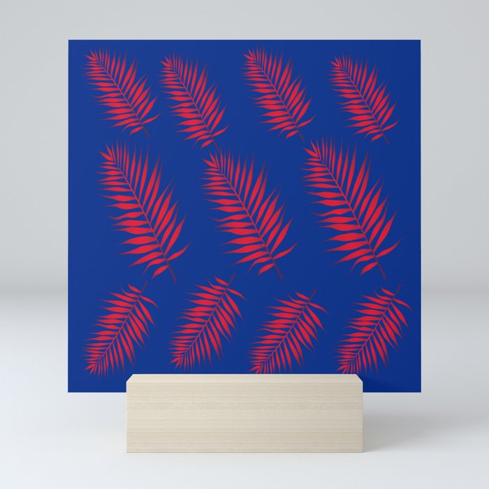 Red Palm Leaves with Blue Background  Mini Art Print