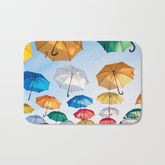 umbrellas flying Bath Mat