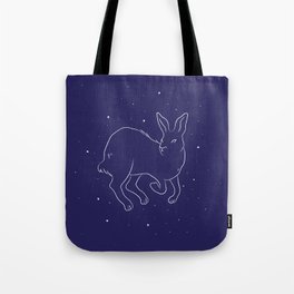 Arctic hare in a winter starry night Tote Bag