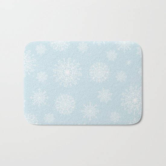 Assorted White Snowflakes On Light Blue Background Bath Mat