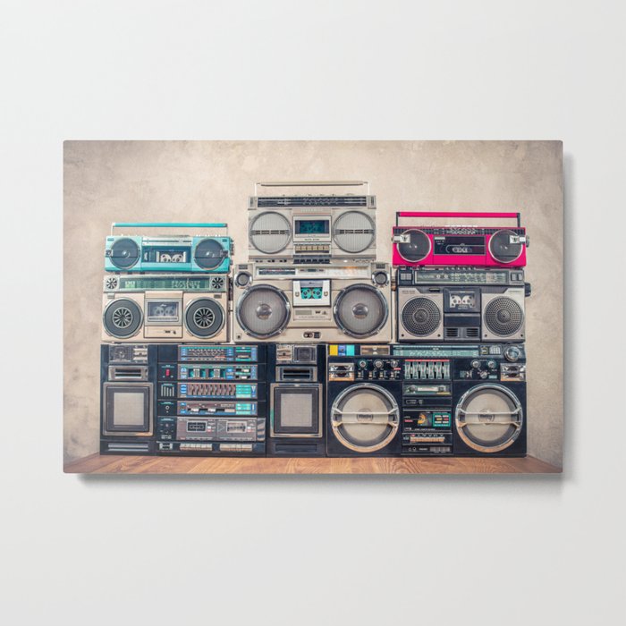 Retro old school design ghetto blaster stereo radio cassette tape recorders boombox tower from circa 1980s front concrete wall background. Vintage style filtered photo Metal Print