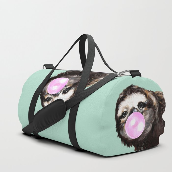 Bubble Gum Sneaky Sloth in Green Duffle Bag