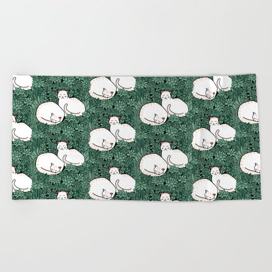 Cats in a succulent garden Beach Towel