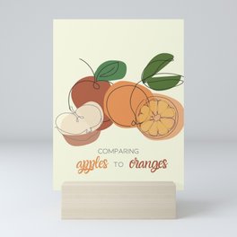 Comparing Apples to Oranges Mini Art Print