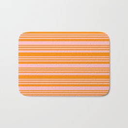 [ Thumbnail: Pink & Dark Orange Colored Lined Pattern Bath Mat ]