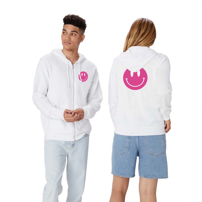 white hoodie with pink smiley face