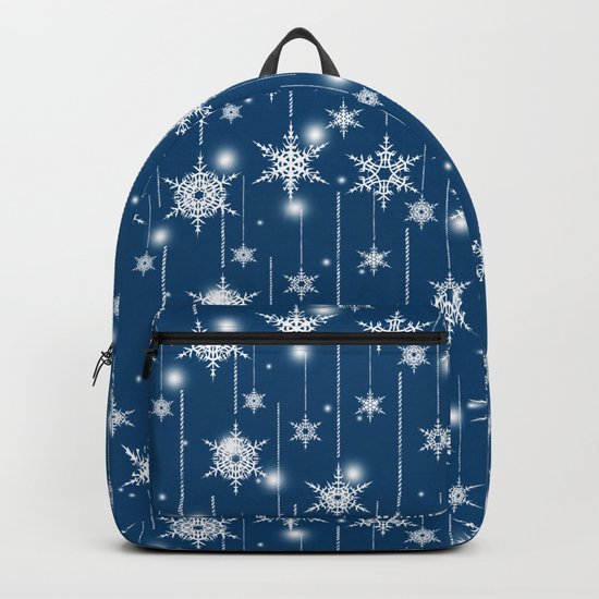 Christmas pattern. White snowflakes on a blue background. Backpack