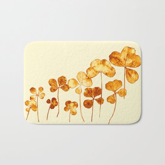 golden clover on cream- pink Bath Mat
