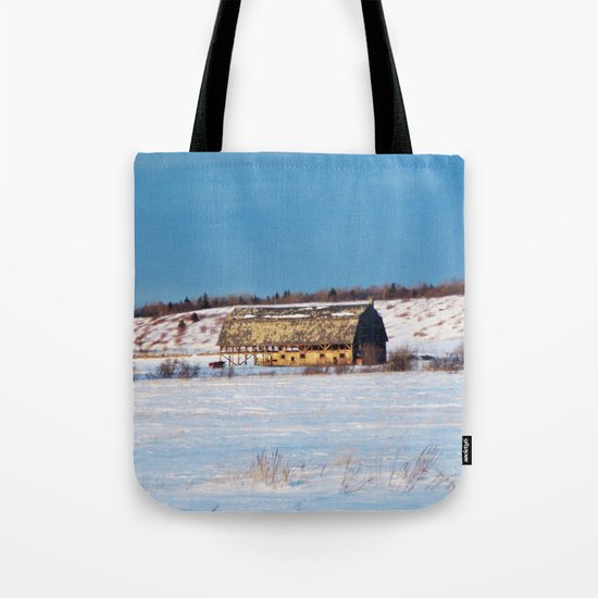 Barn gets a little glow from the Sun as it sits, waiting to be torn apart. Tote Bag
