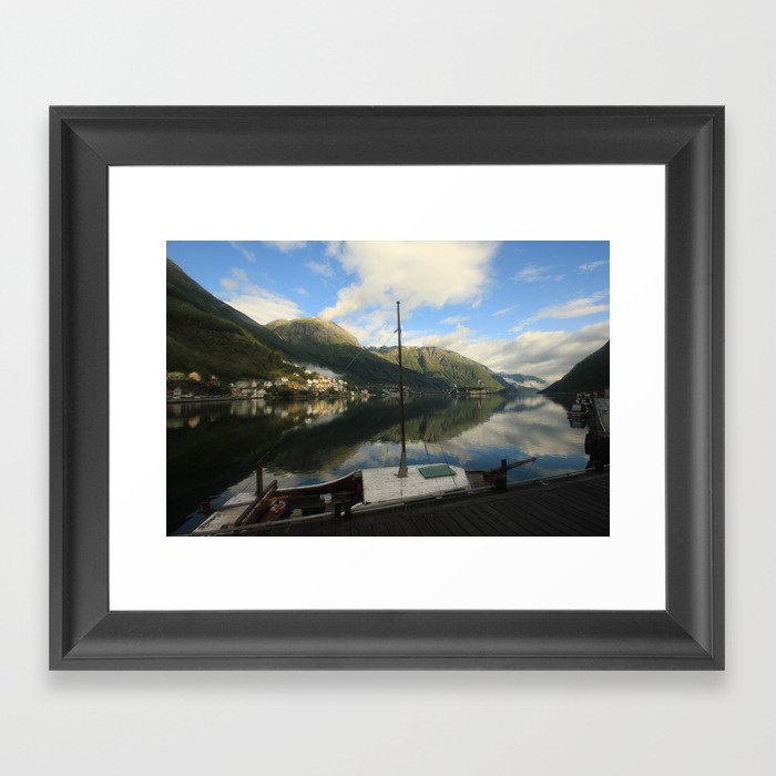 Boat on dock Framed Art Print