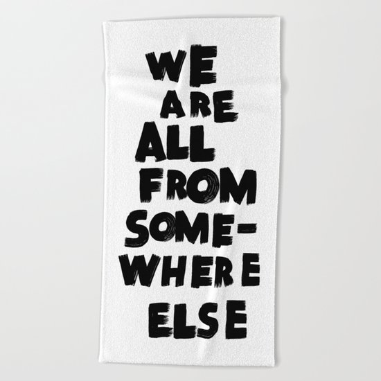 we are all from somewhere else Beach Towel