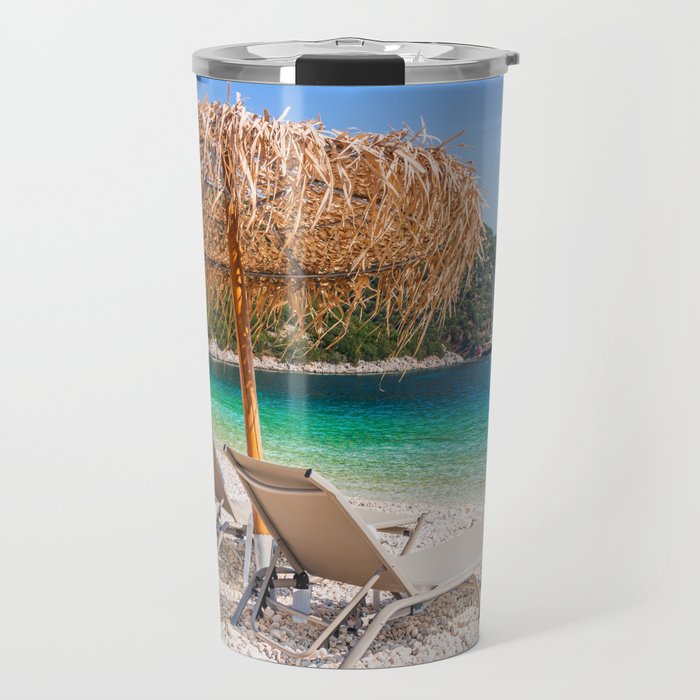 Kefalonia, Greece. Beach chair and umbrella at the Antisamos beach. Travel Mug