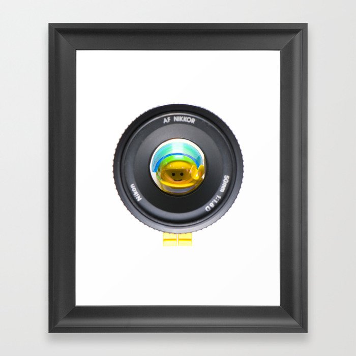 LEGO Spaceman behind a Nikon lens Framed Art Print