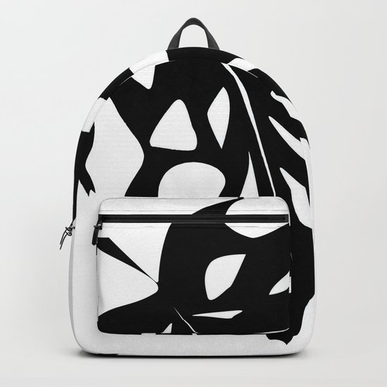 Black leaf monstera on white background . Backpack