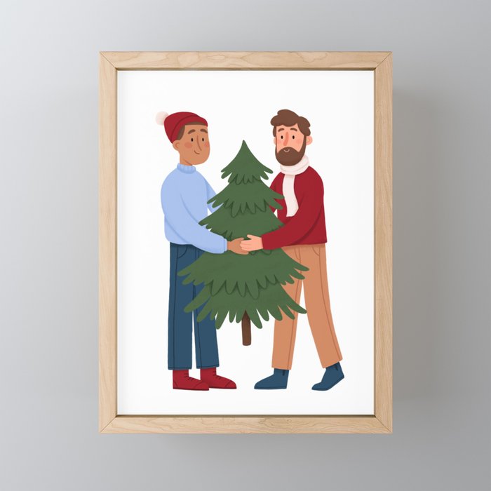Couple with christmas tree Framed Mini Art Print