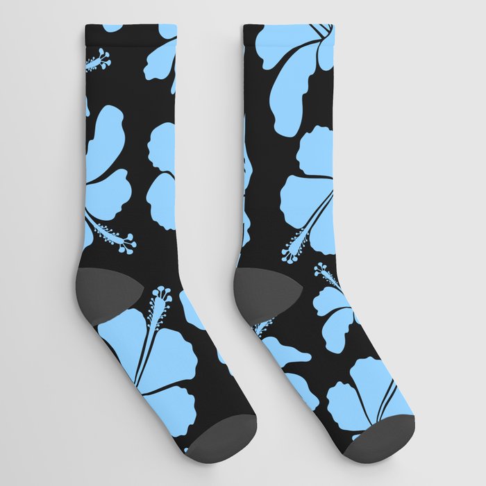 Bright hawaiian seamless pattern with tropical hibiscus flowers on black background in blue colors. Socks
