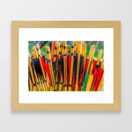 Colorful shafts of wooden arrows Framed Art Print