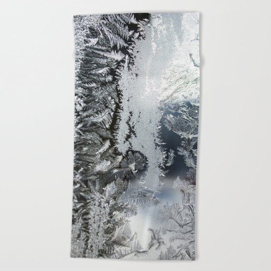 Frosty window Beach Towel