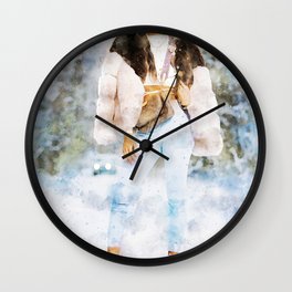 Woman In White Fur Jacket And Blue Denim Jeans Standing On Snow Covered Ground During Daytime Wall Clock