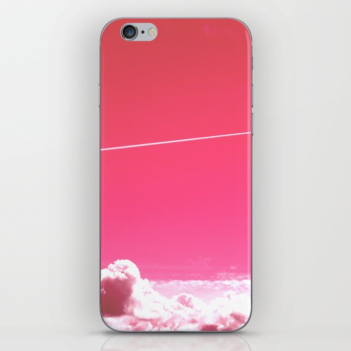 The trail of a flying airplane iPhone Skin