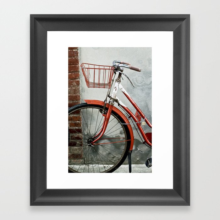Red bicycle Framed Art Print