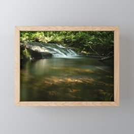 Waterfall in green forest with rocks at sunset	 Framed Mini Art Print