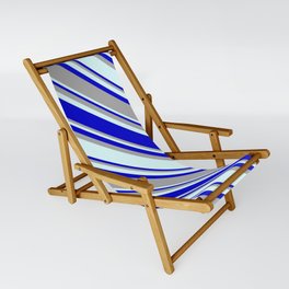 [ Thumbnail: Blue, Dark Grey & Light Cyan Colored Pattern of Stripes Sling Chair ]
