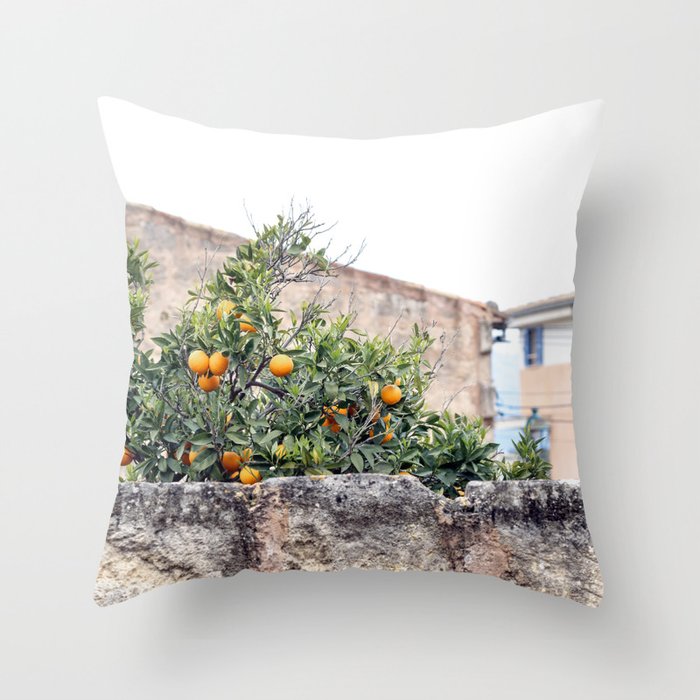 Orange Tree Behind the Stonewall Mallorca Spain Throw Pillow