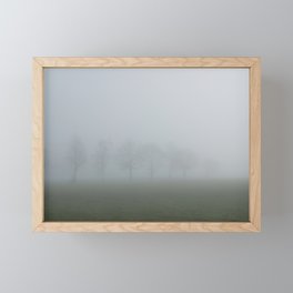 Trees in morning fog Framed Mini Art Print