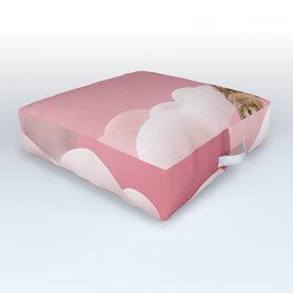 Goldendoodle Laying on Pastel Pink Podium with Cloud Outdoor Floor Cushion
