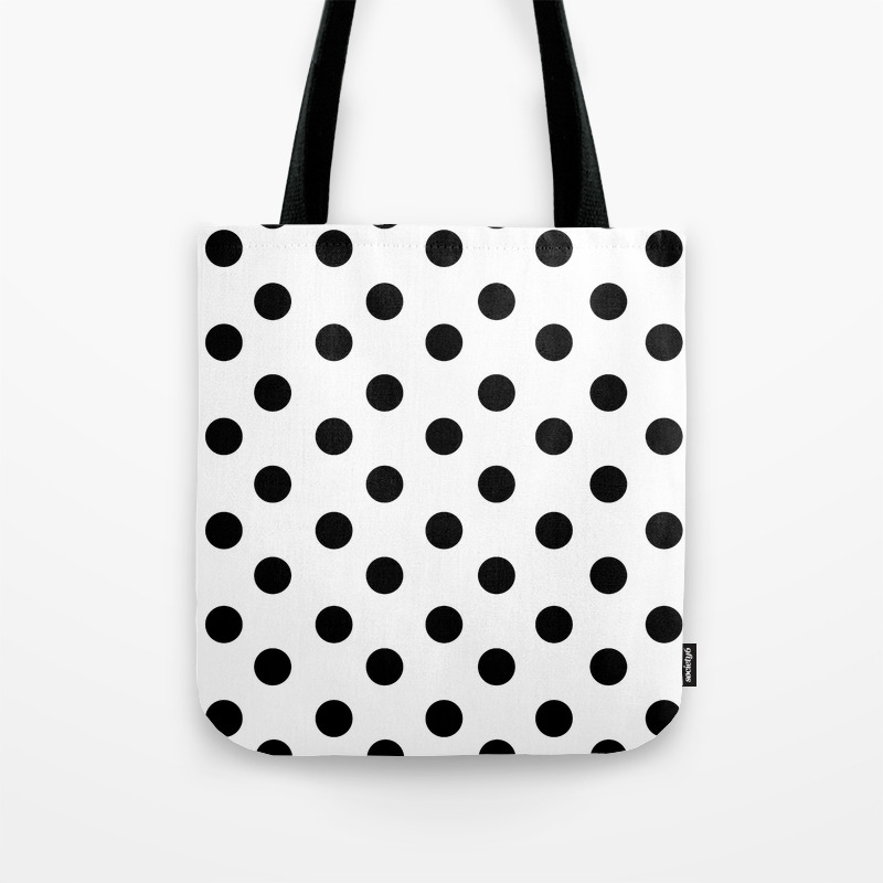 black and white polka dot luggage