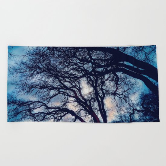 Mystic trees Beach Towel