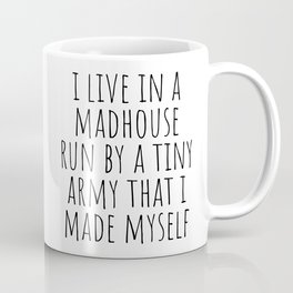 I live in a madhouse Mug