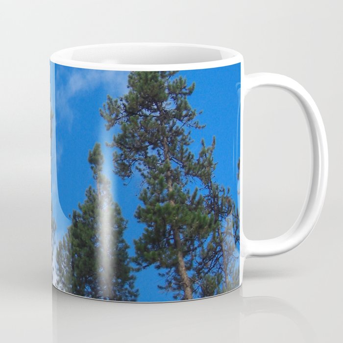 Tree line in a blue sky Coffee Mug