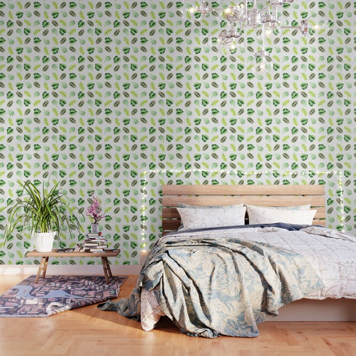 Tropical leaves in green on white Wallpaper