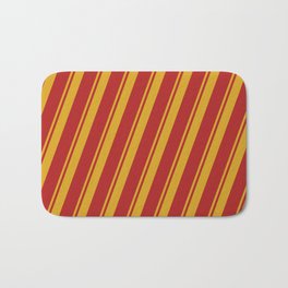 [ Thumbnail: Goldenrod & Red Colored Lined Pattern Bath Mat ]