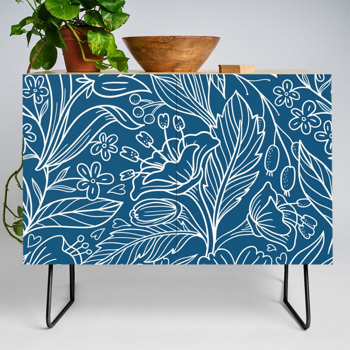 Leaves and flowers pattern on a dark blue background Credenza