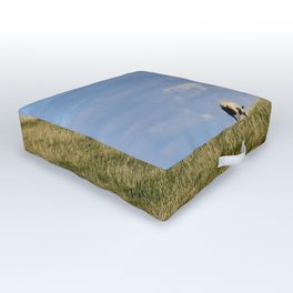Rear view of three Sheep grazing on a hill Outdoor Floor Cushion